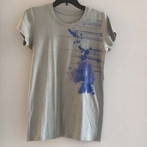 - Gray tee with blue and purple decoration